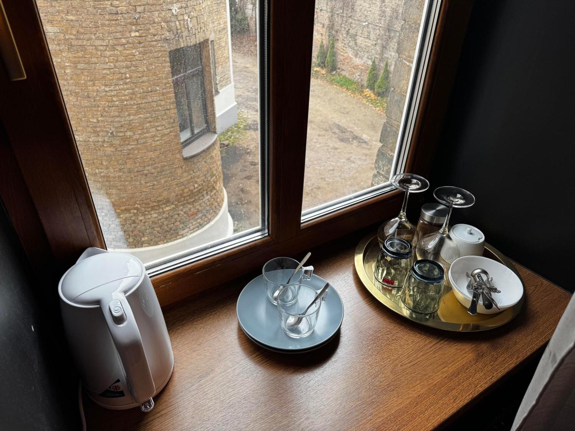 Aparthotel Riga Exterior photo A tea tray in a hotel room